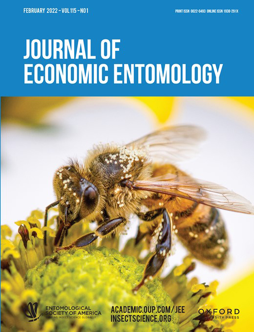 Journal of Economic Entomology cover, featuring honey bee on a flower
