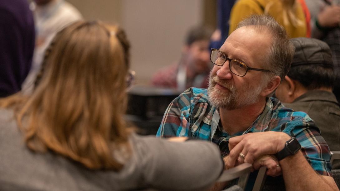 annual meeting attendees sitting 
